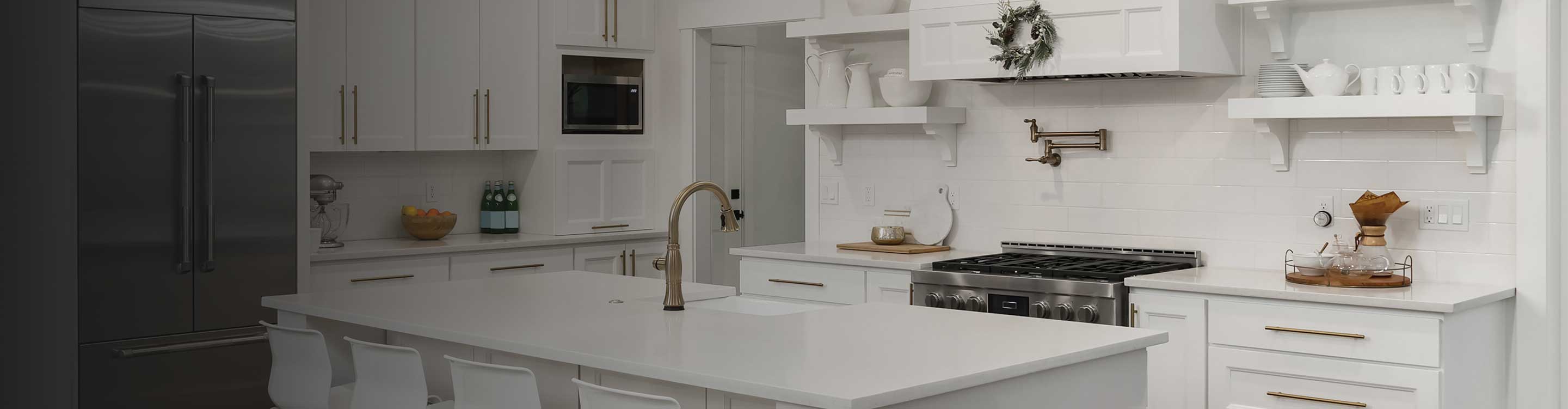 White tile backsplash in a white kitchen